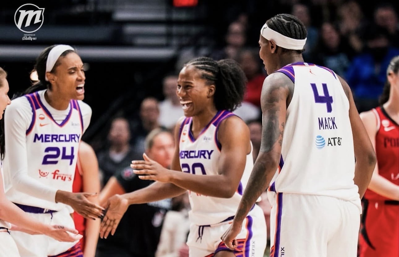 Phoenix Mercury teammates, DeWanna Bonner (no. 24), Sha Carter (No. 20) and Natasha Mack (no. 4) celebrate during game against the Portland Fire on June 5. (Photo- Phoenix Mercury)