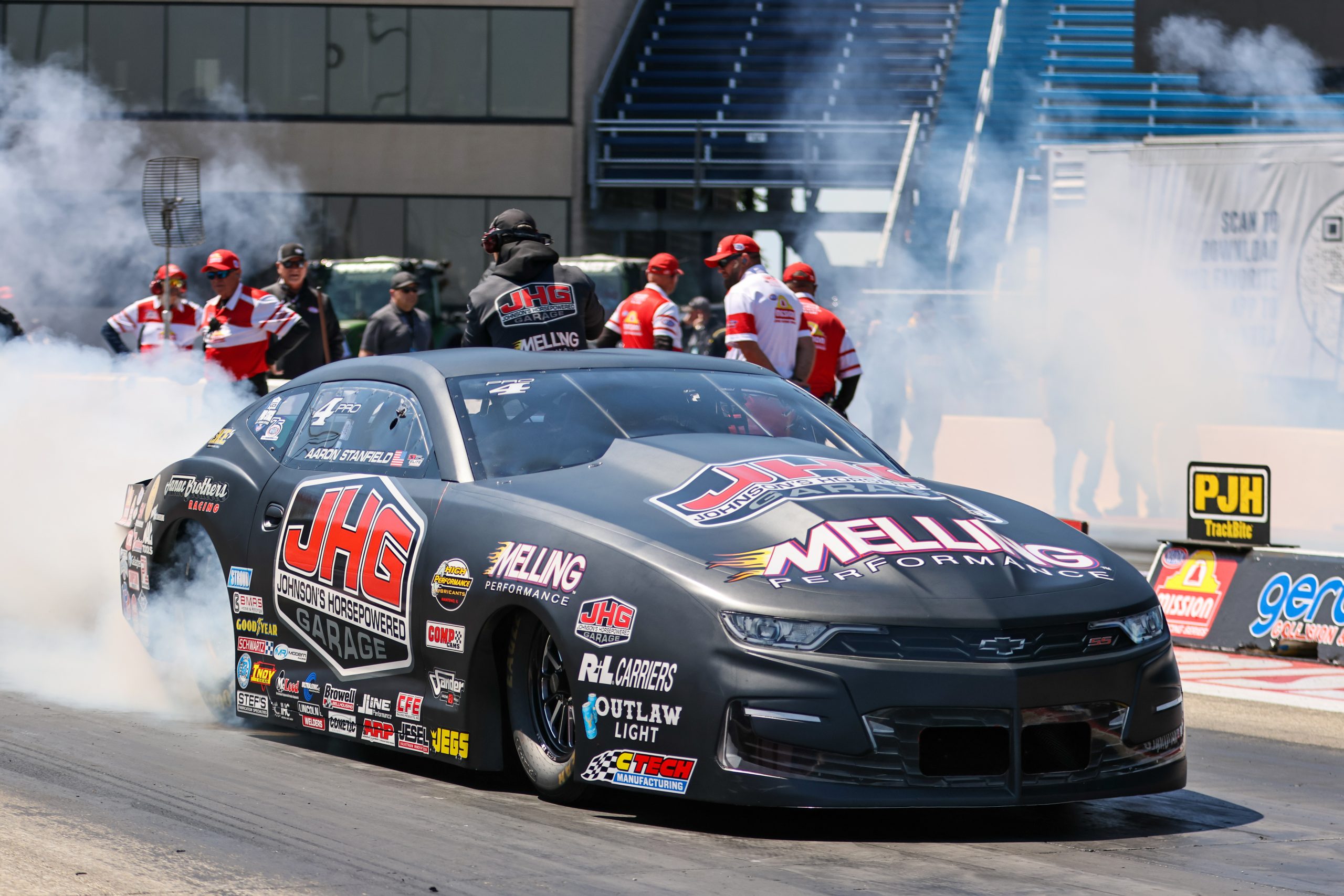Aaron Stanfield completes a burnout during the Chicago race that he won earlier this year.
