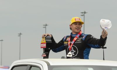 Jordan Vandergriff hoists his trophy after winning the Mission Foods 2 Fast, 2 Tasty Challenge at New England Dragway