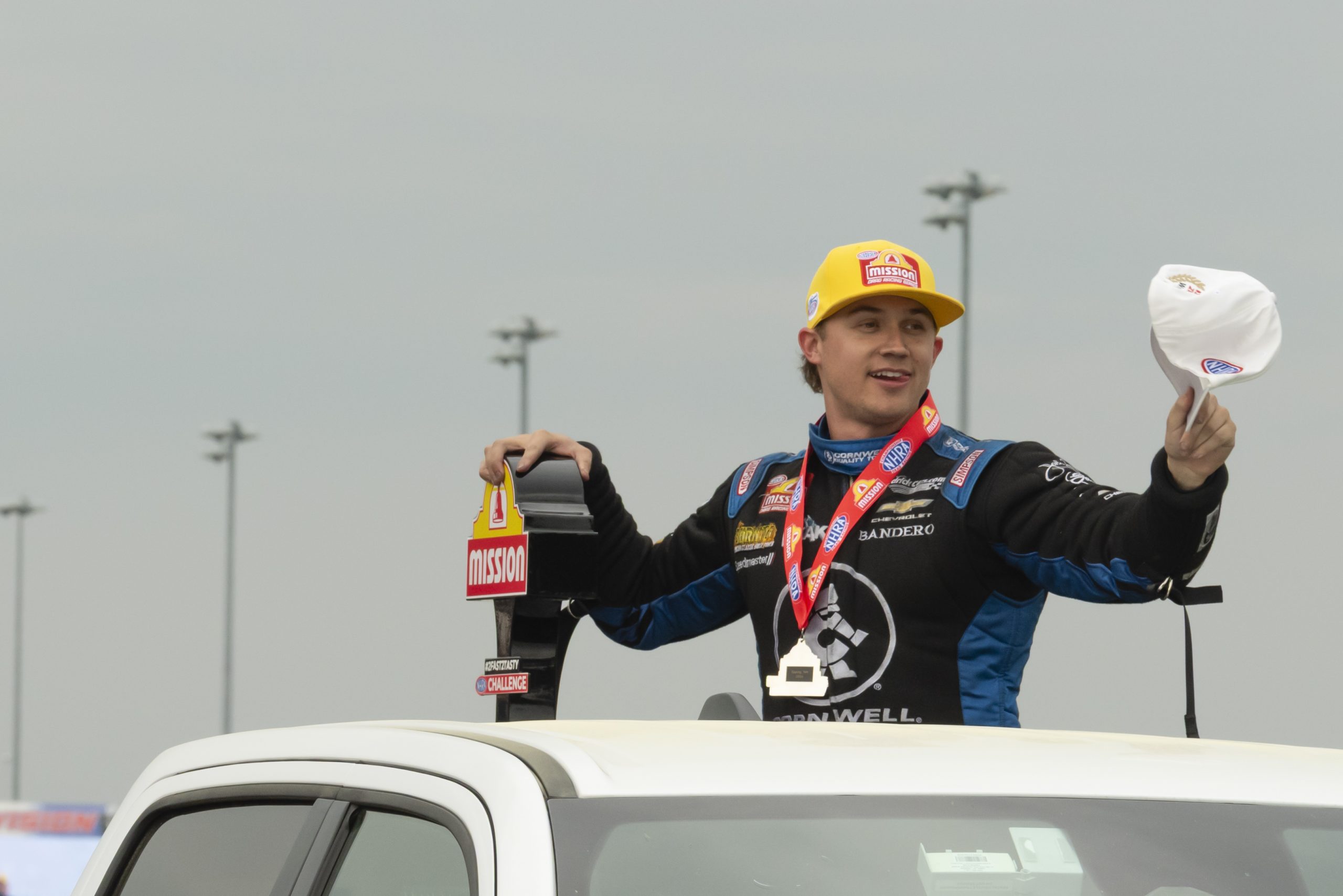 Jordan Vandergriff hoists his trophy after winning the Mission Foods 2 Fast, 2 Tasty Challenge at New England Dragway