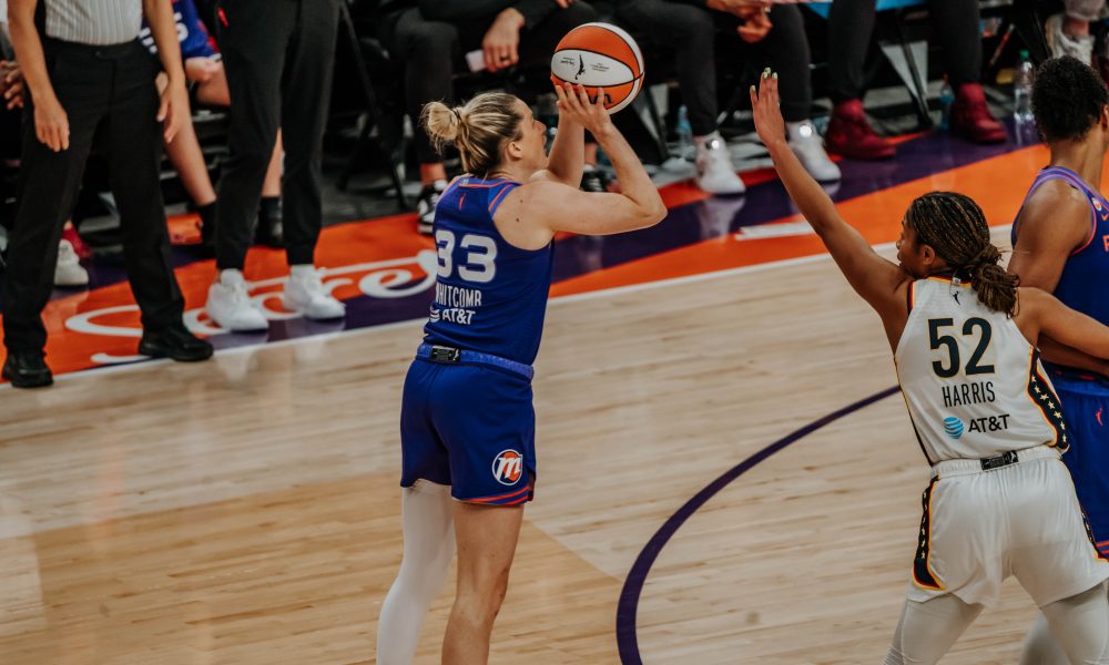 Phoenix Mercury guard Sami Whitcomb (No. 33) attempts a three-pointer during a game against the Indiana Fever at Mortgage Matchup Center on July 9 (Photo: Adrianna Peralta | The Podium Finish)