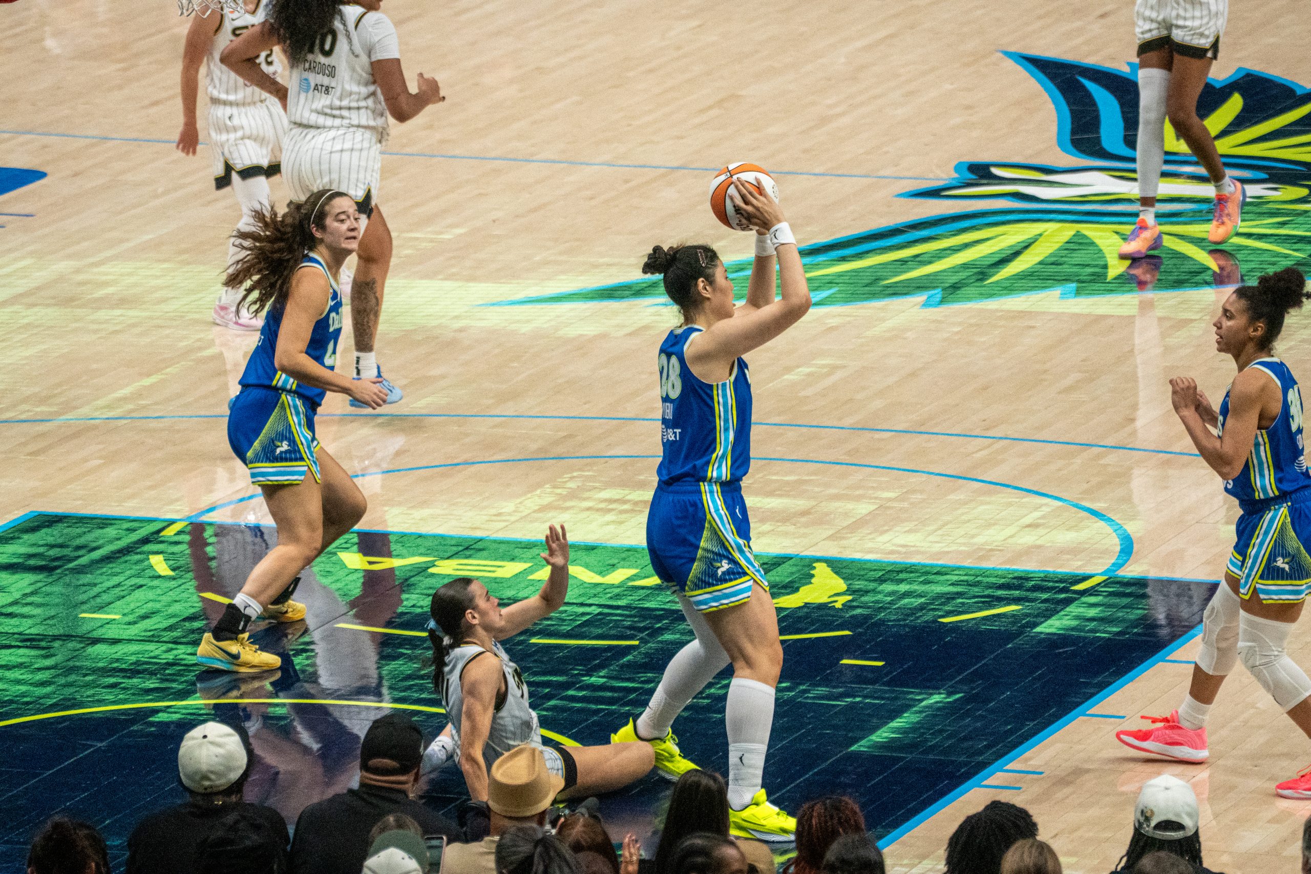 Wings Li Yueru grabs the rebound against the Chicago Sky on Sunday, July 13, 2026 at the American Airlines Center in Dallas. (Photo: Mason Garcia | The Podium Finish)