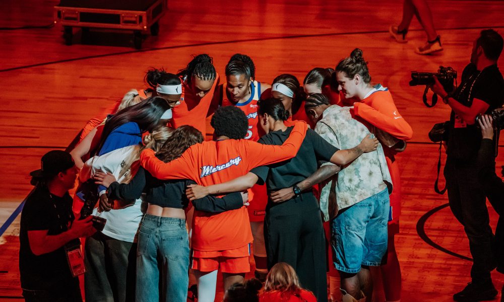 Phoenix Mercury huddle around before taking on the Seattle Storm at home on July 2. (Photo- Adrianna Peralta, Trippy Traveler Media)