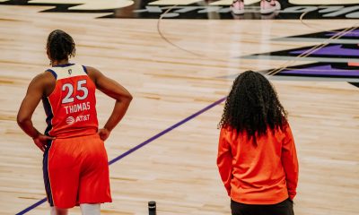 Phoenix Mercury forward Alyssa Thomas (No. 25) and associate head coach Kristi Toliver on sidelines during a home game against the Seattle Storm at Mortgage Matchup Center on July 2. (Photo: Adrianna Peralta | The Podium Finish)