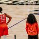 Phoenix Mercury forward Alyssa Thomas (No. 25) and associate head coach Kristi Toliver on sidelines during a home game against the Seattle Storm at Mortgage Matchup Center on July 2. (Photo: Adrianna Peralta | The Podium Finish)